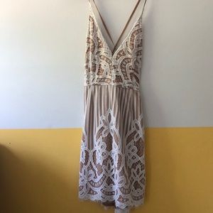 White lace and nude dress with lace up back